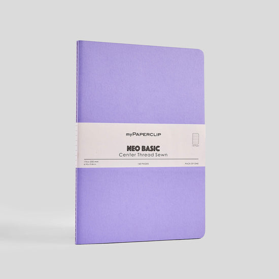 Purple notebook with a white label on a light gray background
