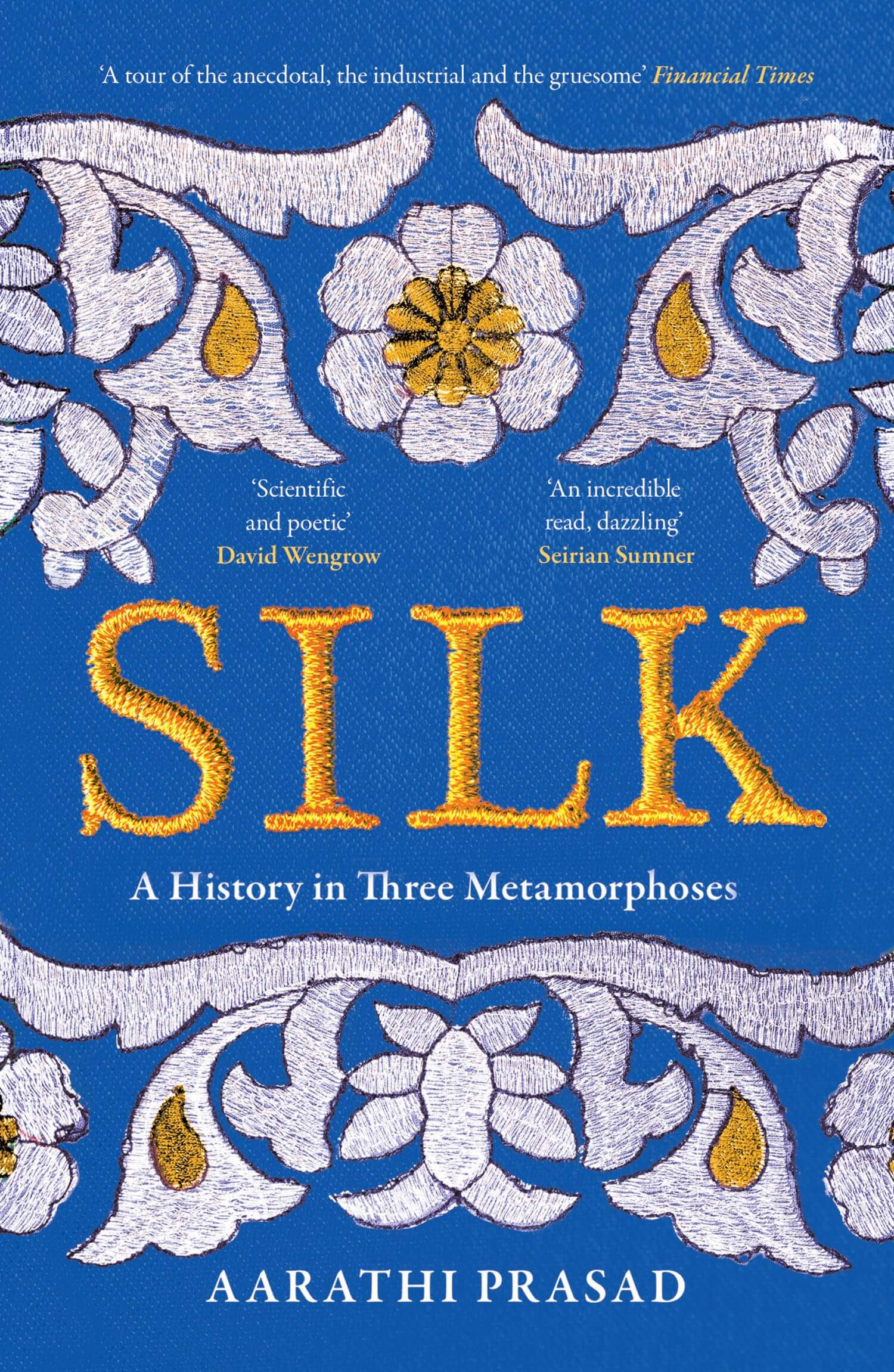A book cover of 'Silk' by Aarathi Prasad featuring a detailed blue and gold floral and geometric patterned design.