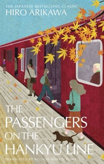 Cover of the book 'The Passengers on the Hankyu Line' by Hiro Arikawa featuring illustrations of people on a train with autumn leaves.