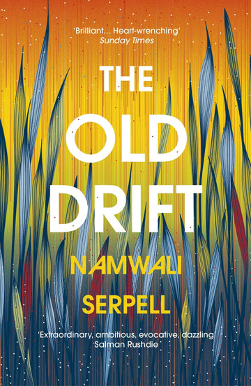 This image features the cover of "The Old Drift" by Namwali Serpell, which won the 2015 Caine Prize for African Writing. The book's cover displays a vibrant and textured artwork of what appears to be stylized grasses or reeds against a warm, gradient background ranging from orange to blue.