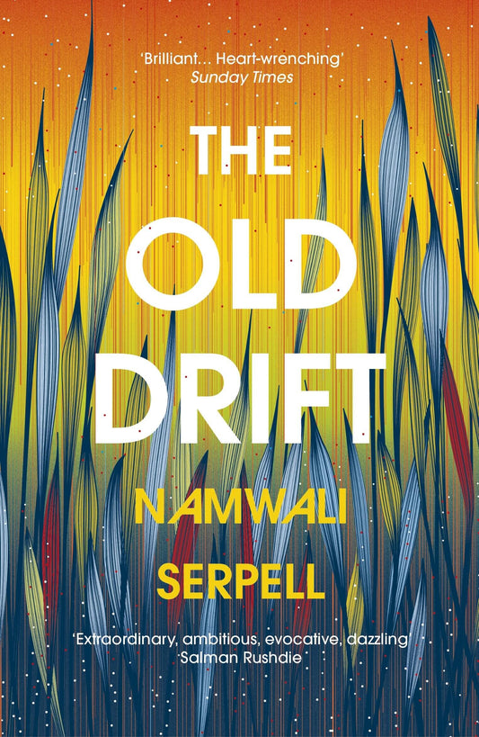 This image features the cover of "The Old Drift" by Namwali Serpell, which won the 2015 Caine Prize for African Writing. The book's cover displays a vibrant and textured artwork of what appears to be stylized grasses or reeds against a warm, gradient background ranging from orange to blue.