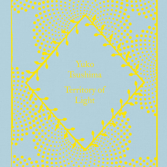 A book cover of 'Territory of Light' by Yuko Tsushima with a blue background and yellow dotted pattern.