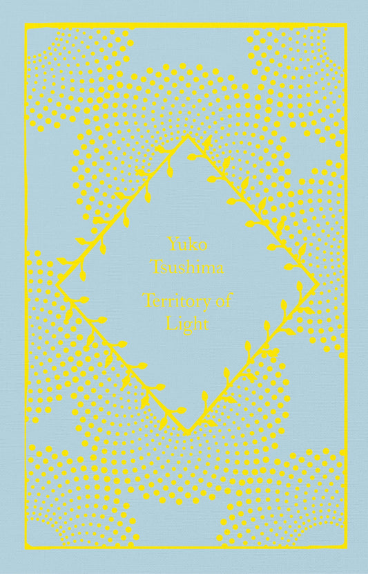A book cover of 'Territory of Light' by Yuko Tsushima with a blue background and yellow dotted pattern.