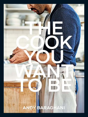 A cookbook cover featuring a man in a kitchen setting, with the title 'The Cook You Want to Be' by Andy Baraghani.