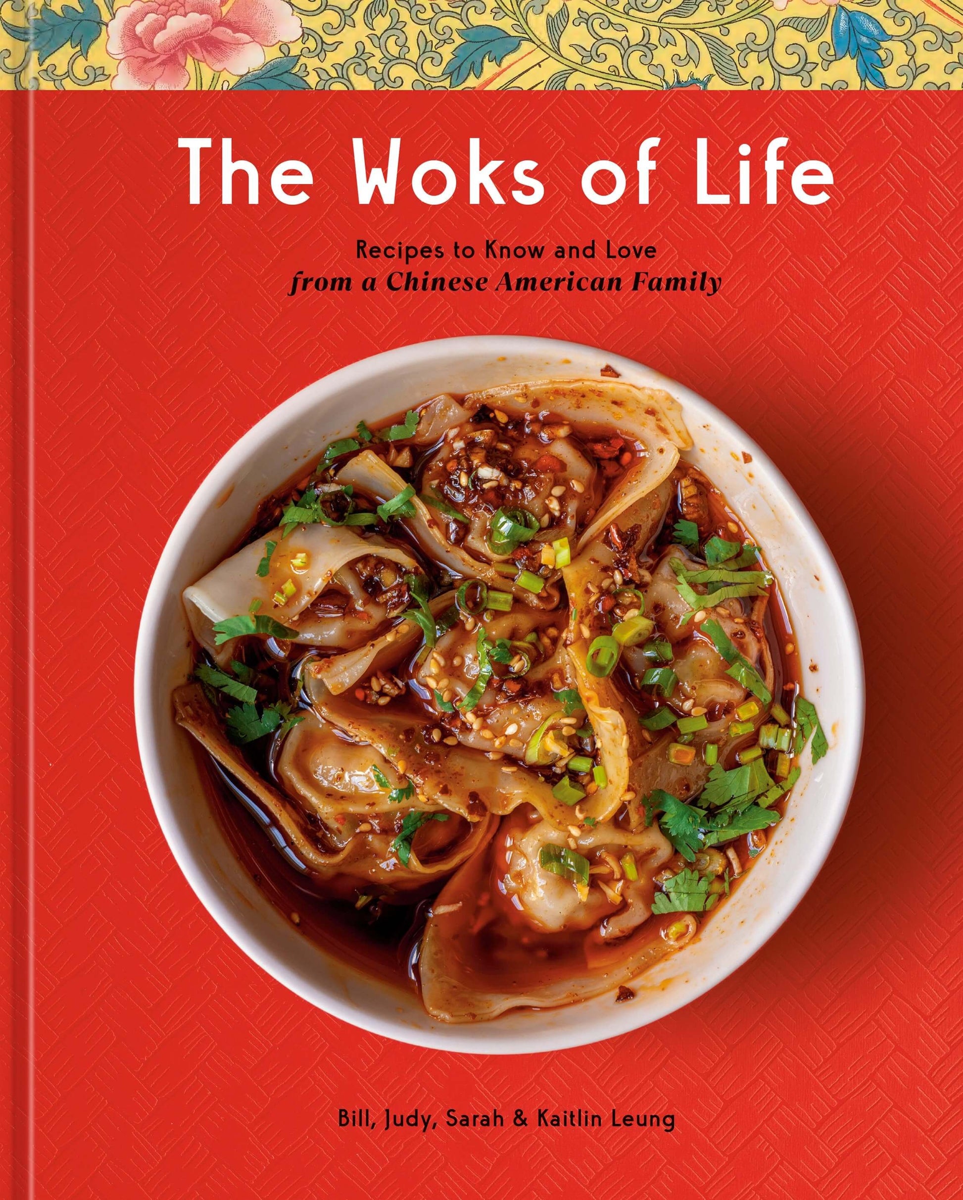 The cover of the book 'The Woks of Life' featuring a bowl of dumplings, on a red background with a floral pattern at the top.