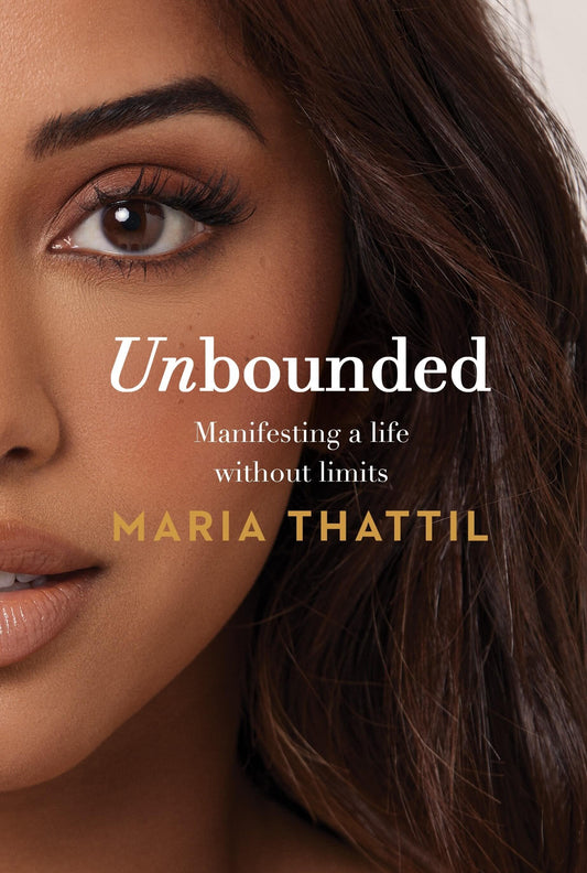 Book cover of 'Unbounded' featuring a close-up portrait of the author, Maria Thattil, with a subtle background.